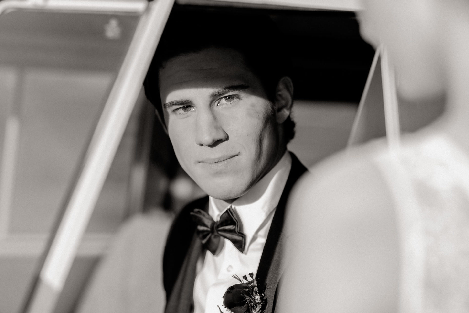 grooms portrait-barn wedding germany-marsala decoration-vw t1 wedding car-Steinbachhof wedding
