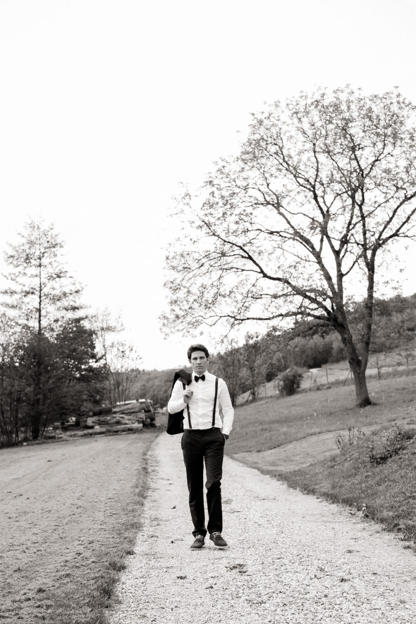 barn wedding germany-groom portrait-vw t1 wedding car-vintage wedding