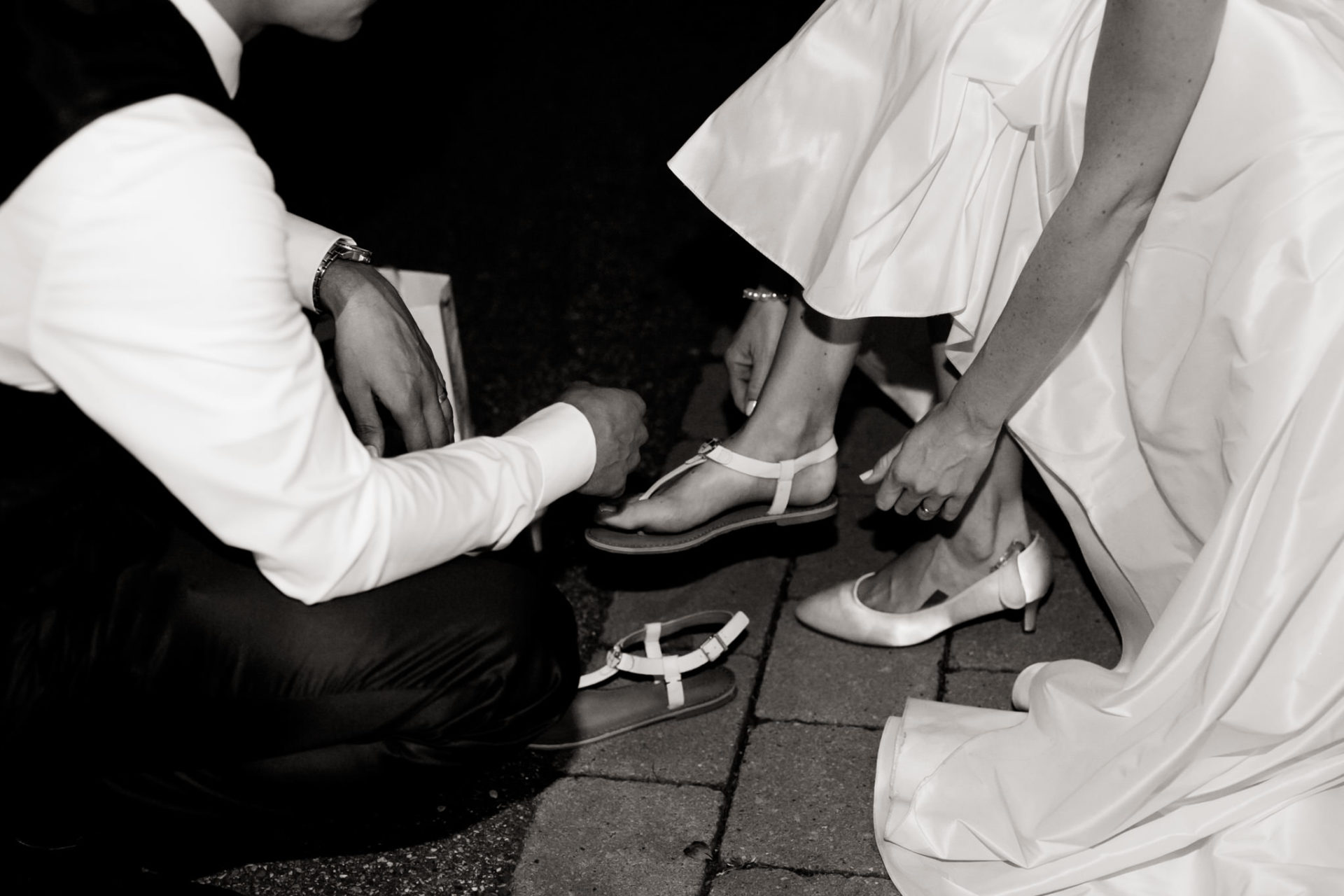 vineyard barn wedding south germany-42 wedding photographer stuttgart-vineyard summer wedding-bride shoes flats-changing shoes bridal gown