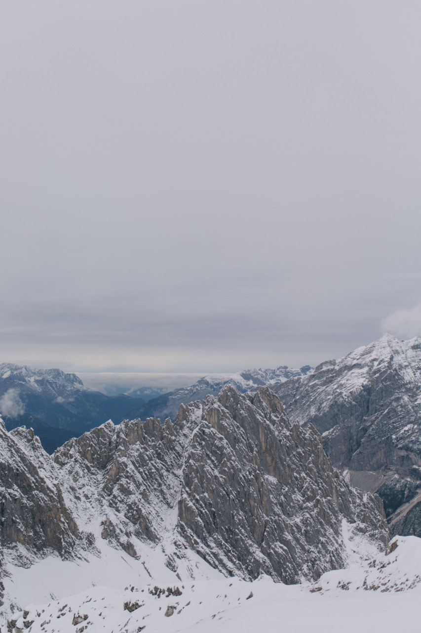 mountain wedding-hafelekar innsbruck-mountaintop ceremony-wedding photographer austria-snow bride boots